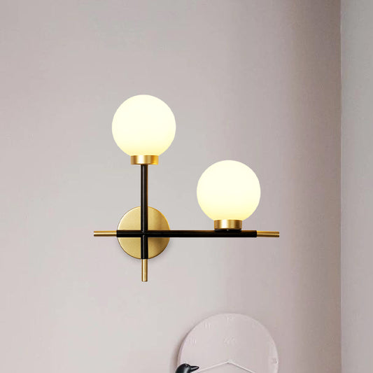 2-Bulb Milky Glass Sconce Light Fixture Modern Black Double Globe Living Room Wall Lamp with Cross Design Clearhalo 'Cast Iron' 'Glass' 'Industrial' 'Modern wall lights' 'Modern' 'Tiffany' 'Traditional wall lights' 'Wall Lamps & Sconces' 'Wall Lights' Lighting' 968931