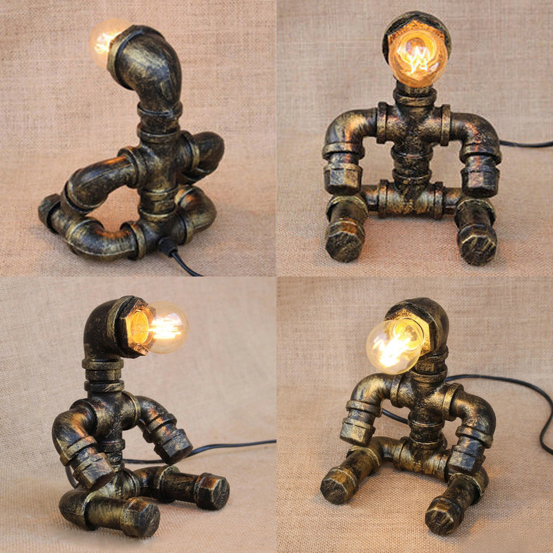 1 Head Table Light Vintage Stylish Sitting Robot Wrought Iron Table Lamp with Plumbing Pipe in Antique Brass Clearhalo 'Lamps' 'Table Lamps' Lighting' 9744