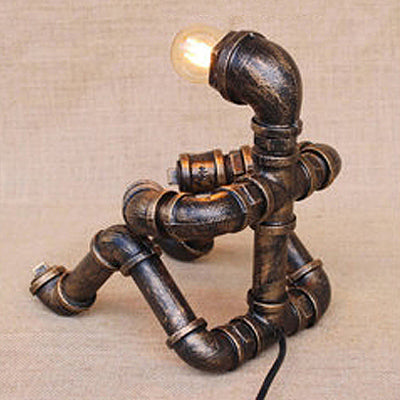 1 Head Table Light Vintage Stylish Sitting Robot Wrought Iron Table Lamp with Plumbing Pipe in Antique Brass Clearhalo 'Lamps' 'Table Lamps' Lighting' 9746