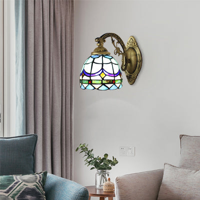 Stained Glass Domed Wall Lamp with Carved Arm 1 Light Tiffany Traditional Wall Lamp in Blue Blue Clearhalo 'Industrial' 'Middle century wall lights' 'Tiffany wall lights' 'Tiffany' 'Wall Lamps & Sconces' 'Wall Lights' Lighting' 98142