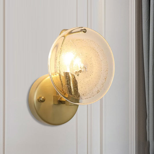 Metal Round Sconce Lamp Postmodern 1 Light Wall Mounted Light Fixture in Gold with Clear Glass Shade Gold Clearhalo 'Cast Iron' 'Glass' 'Industrial' 'Modern wall lights' 'Modern' 'Tiffany' 'Traditional wall lights' 'Wall Lamps & Sconces' 'Wall Lights' Lighting' 982118