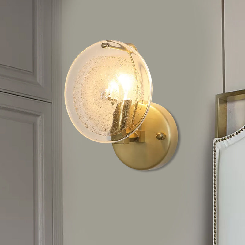 Metal Round Sconce Lamp Postmodern 1 Light Wall Mounted Light Fixture in Gold with Clear Glass Shade Clearhalo 'Cast Iron' 'Glass' 'Industrial' 'Modern wall lights' 'Modern' 'Tiffany' 'Traditional wall lights' 'Wall Lamps & Sconces' 'Wall Lights' Lighting' 982119