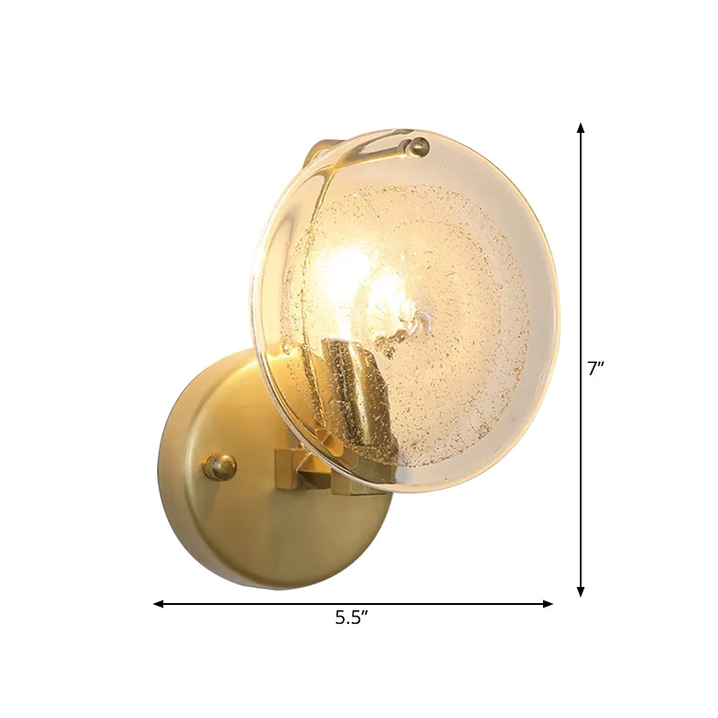 Metal Round Sconce Lamp Postmodern 1 Light Wall Mounted Light Fixture in Gold with Clear Glass Shade Clearhalo 'Cast Iron' 'Glass' 'Industrial' 'Modern wall lights' 'Modern' 'Tiffany' 'Traditional wall lights' 'Wall Lamps & Sconces' 'Wall Lights' Lighting' 982122