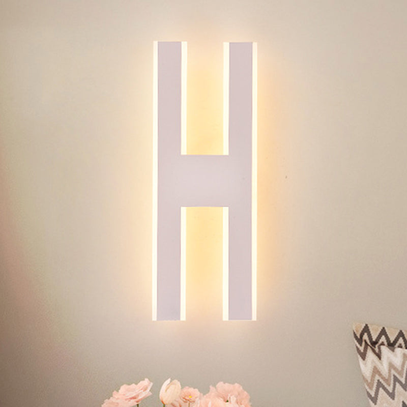 Alphabet Metal Wall Lamp Modern LED White/Black Sconce Light Fixture for Bedside in White/Warm Light Clearhalo 'Cast Iron' 'Glass' 'Industrial' 'Modern wall lights' 'Modern' 'Tiffany' 'Traditional wall lights' 'Wall Lamps & Sconces' 'Wall Lights' Lighting' 983243